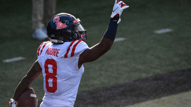 Mississippi Rebels wide receiver Elijah Moore (8) celebrates after a touchdown against the Vanderbilt Commodores during the first half at Vanderbilt Stadium. Mandatory Credit: Christopher Hanewinckel-USA TODAY Sports